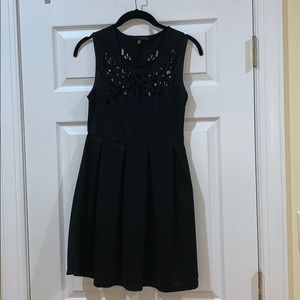 Black fit and flare dress with cut outs